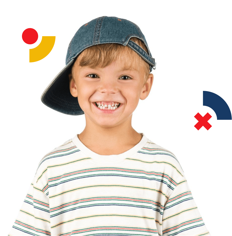 A young boy wearing a hat and smiling.