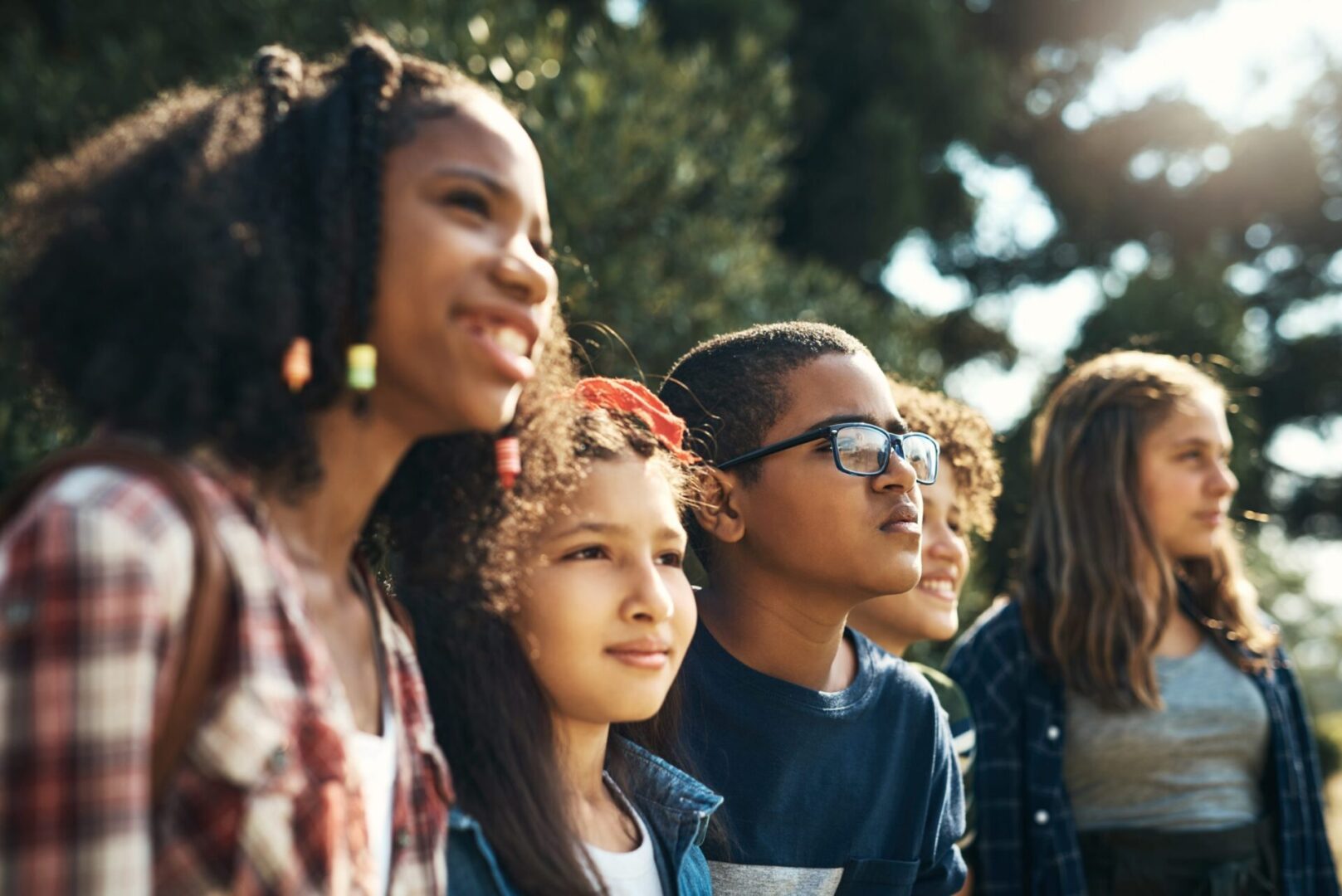 A group of young people standing next to each other.